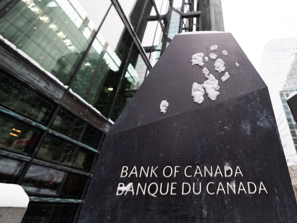 Snow covered Bank of Canada sign in front of the Bank of Canada building in Ottawa on Jan. 27, 2026. 